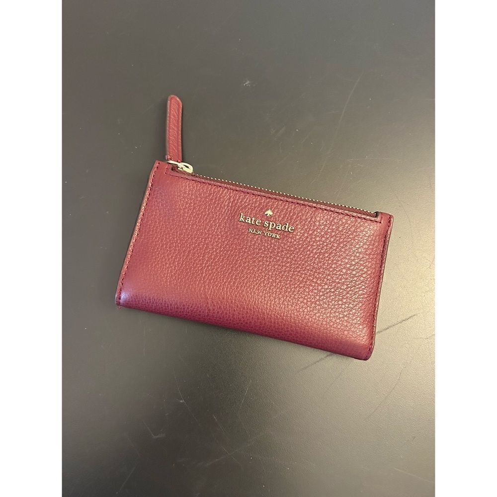 Kate Spade | Jackson Slim Bi-fold Wallet in Cranberry Red